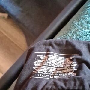 Victoria's Secret Black Crewneck Tee with Interior Care Print